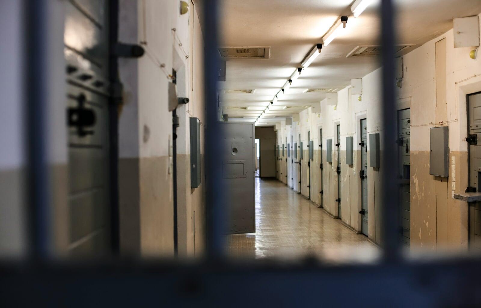 Row of cells along a prison corridor